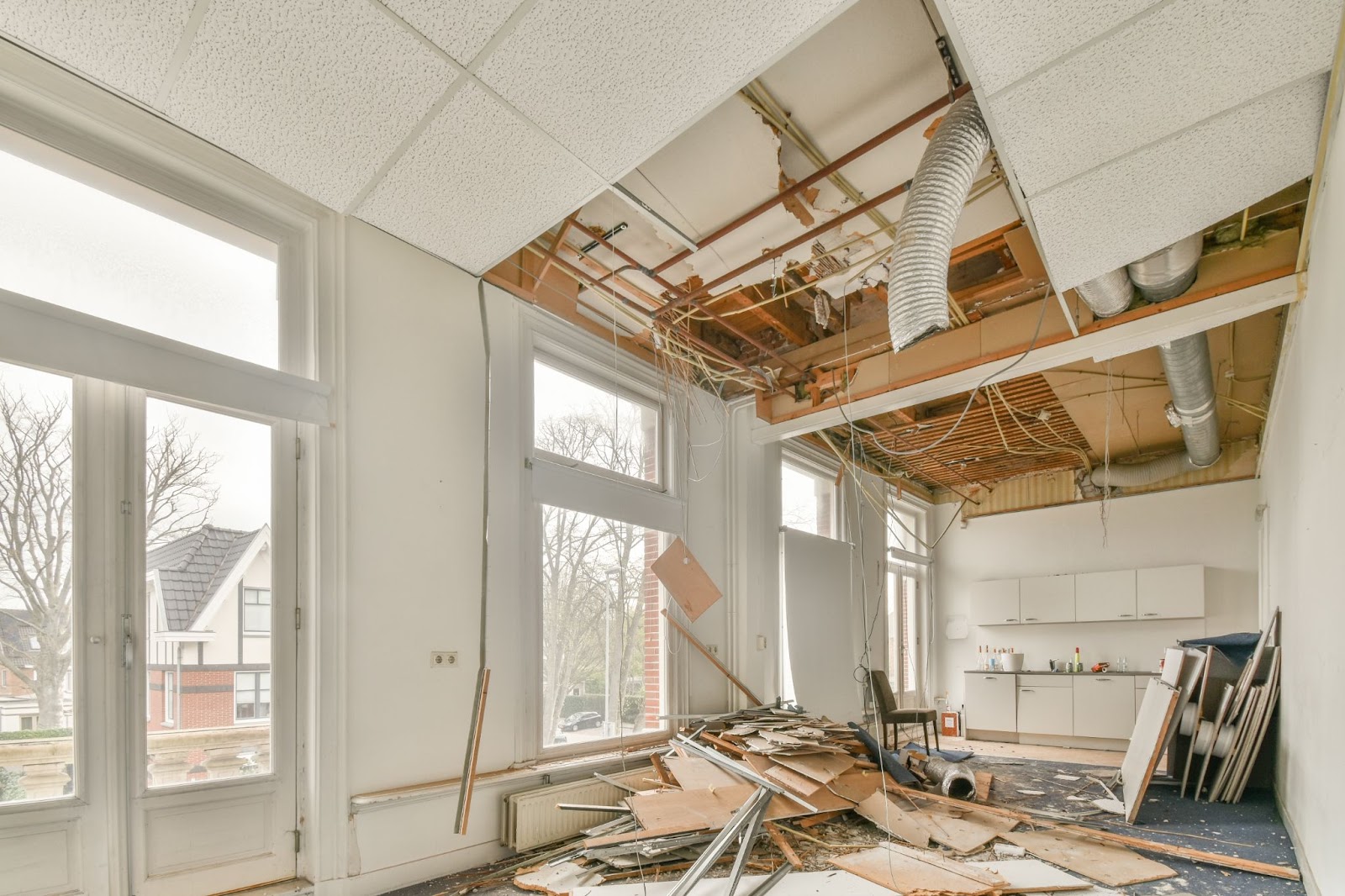 Room with ceiling damage. 