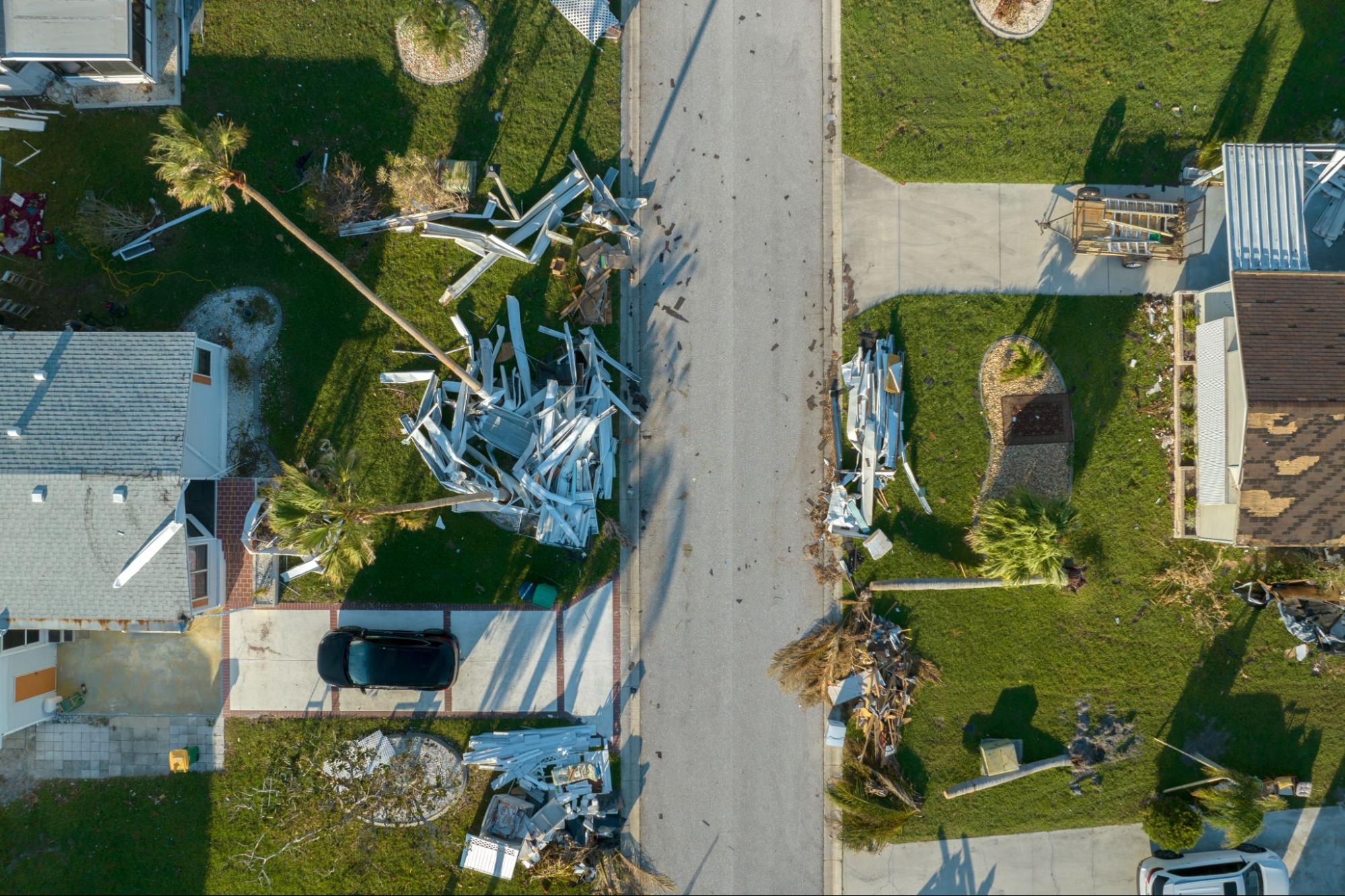 Overhead view of storm damage to a neighborhood. 